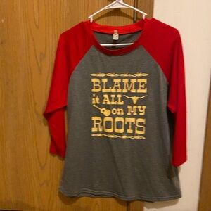 Blame it all on my roots 2x but fits like a L